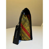 TROUSSE NERA, ORO E ROSSA.
